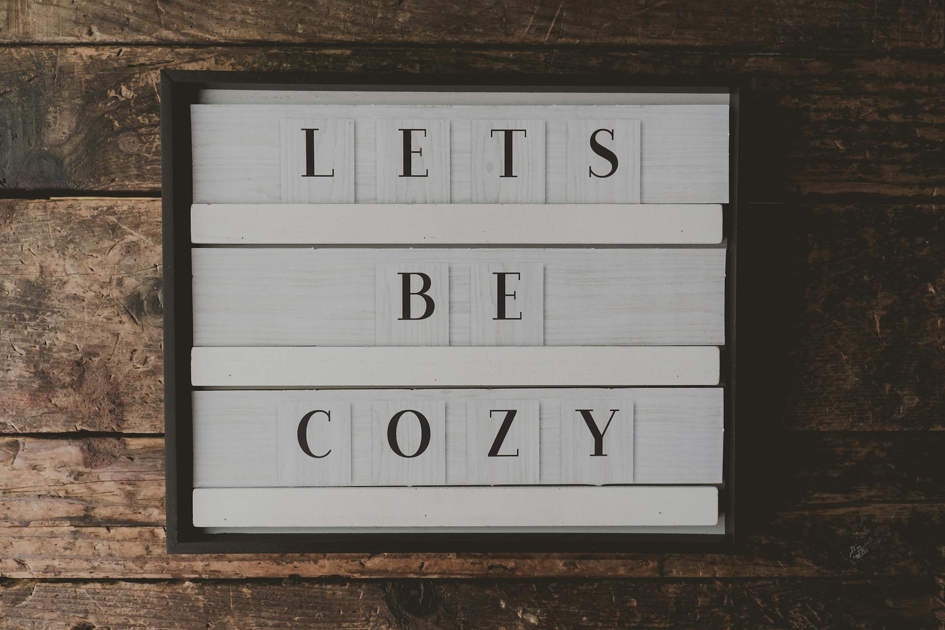 lets be cozy wall decor inside room